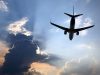 passenger plane flying in clouds